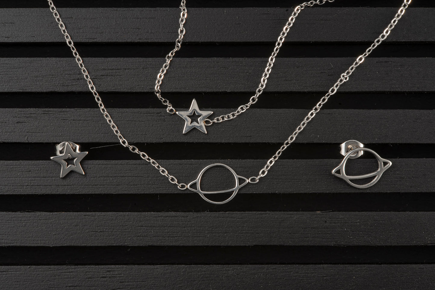 Sets cadena, aretes y pulsera Saturno y Estrella