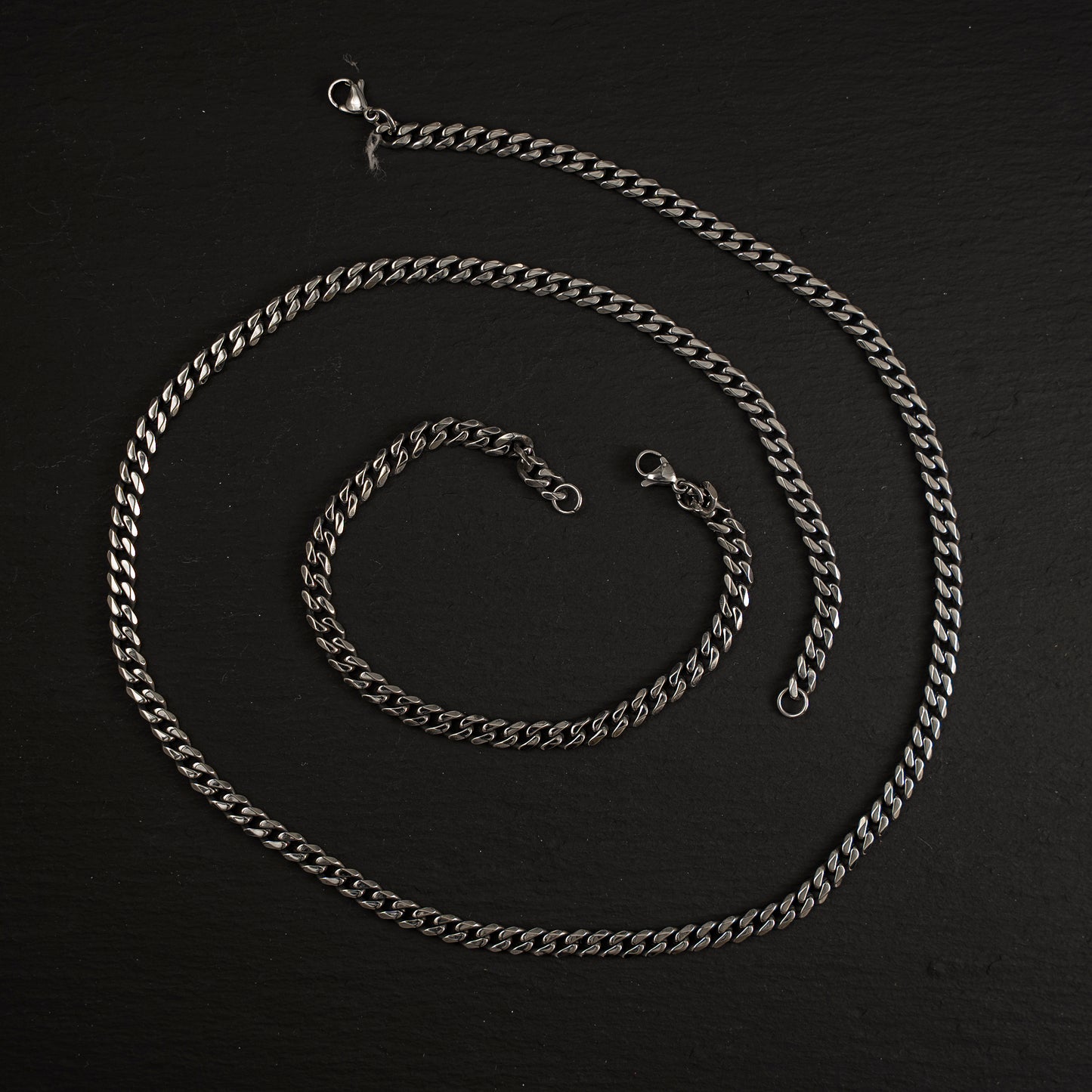 Set de acero Cadena y Brazalete Cubano Dark Oil