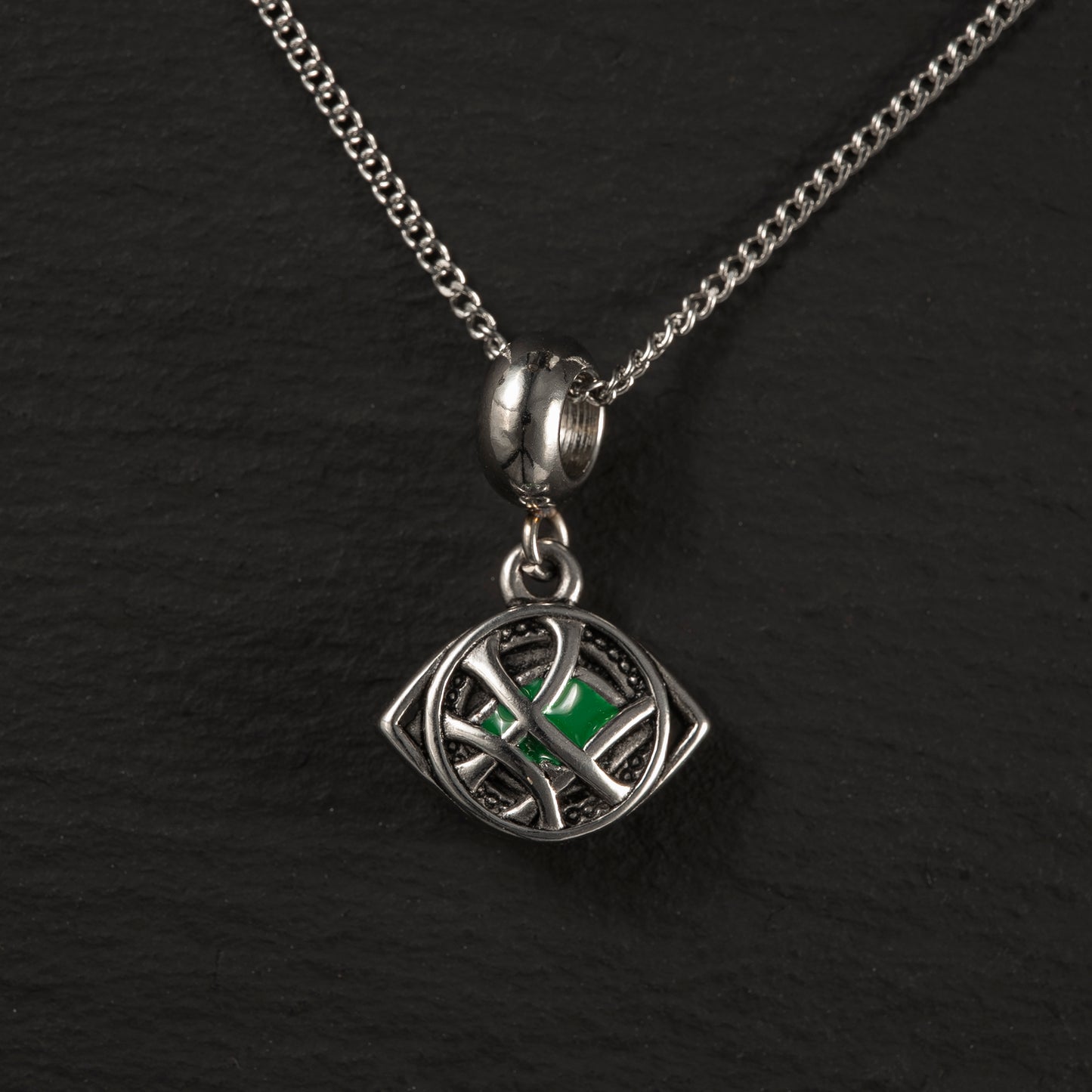Charm acero Ojo de Agamotto