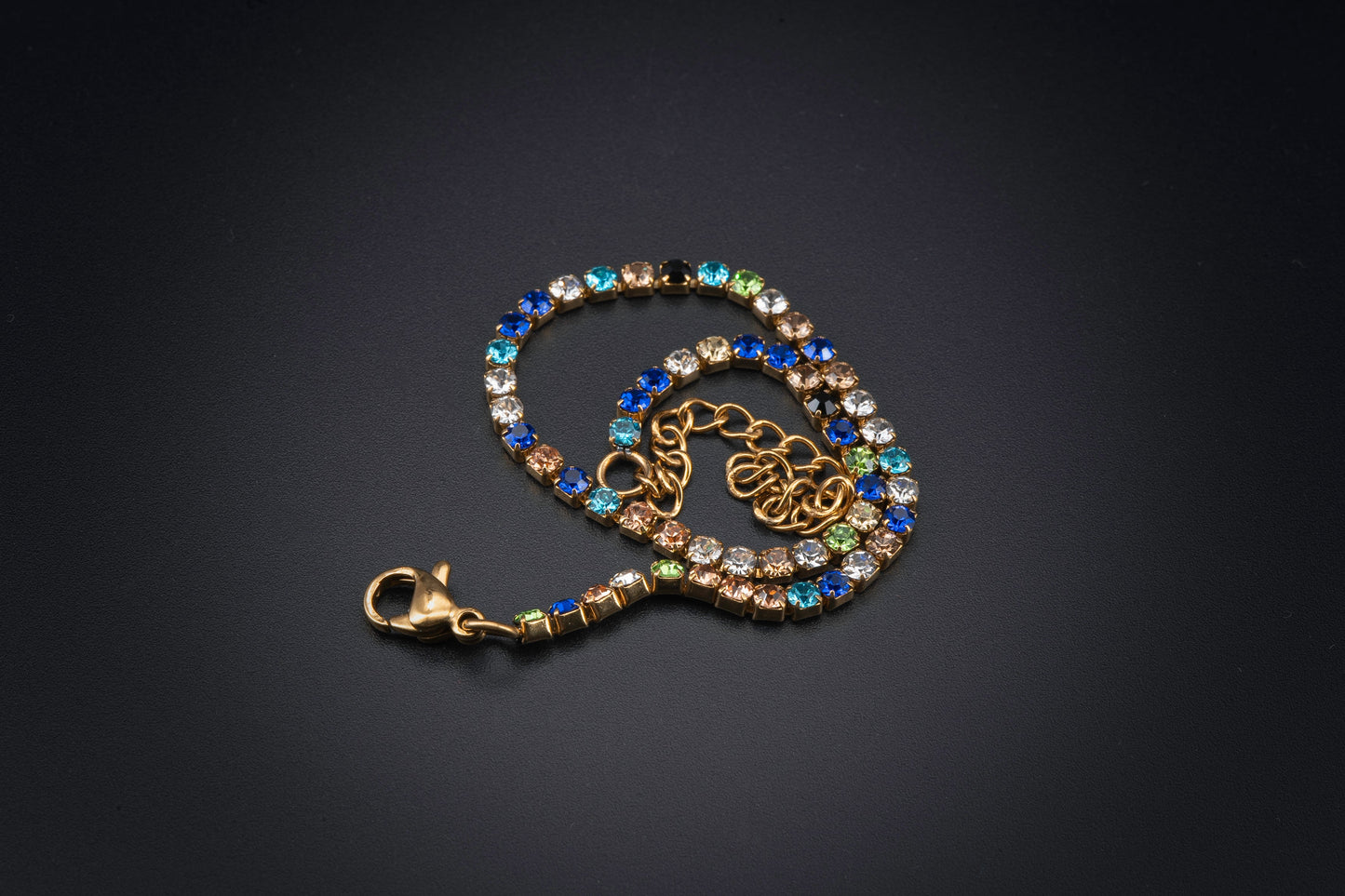 Pulsera de acero dorado multicolor
