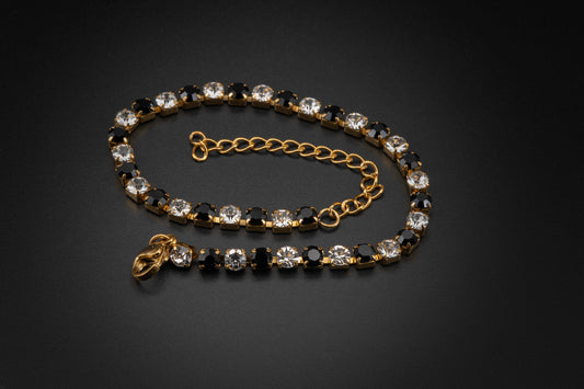Pulsera de acero dorado Cristalino y Negro